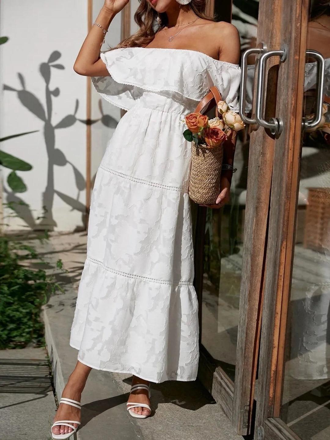 Formal off-shoulder tiered midi dress for women. A sophisticated choice for special occasion evenings.
