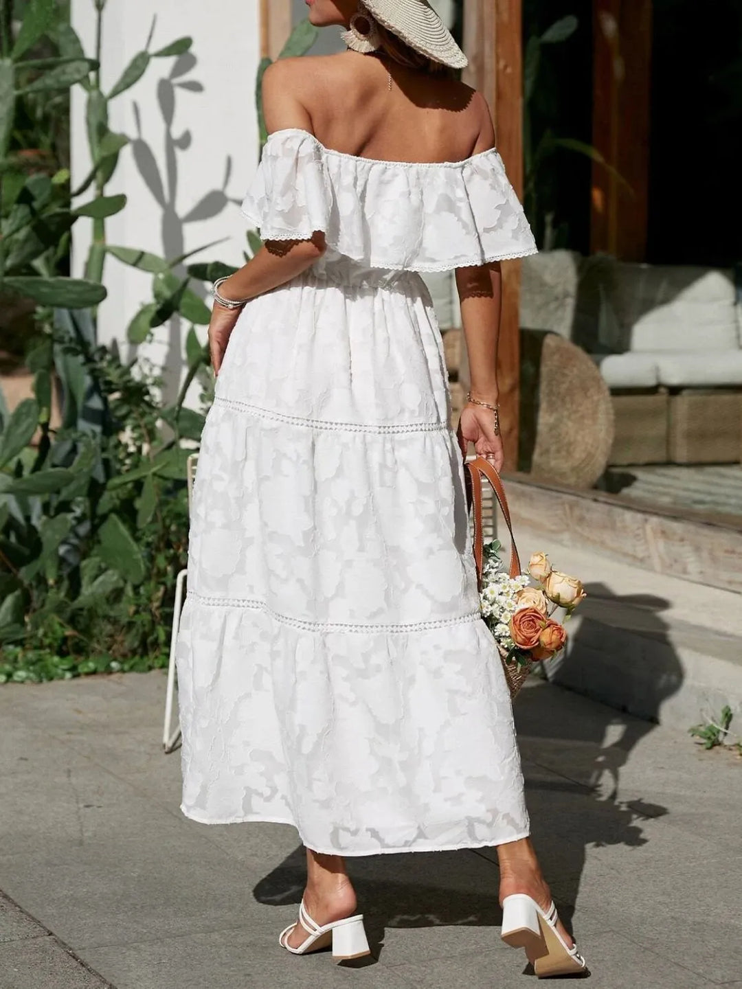 Beautiful women's elegant off-shoulder midi dress, tiered for a graceful wedding guest look.