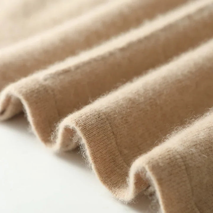 Relaxed fit olive merino wool knit maxi skirt, offering comfort without compromising on winter style.