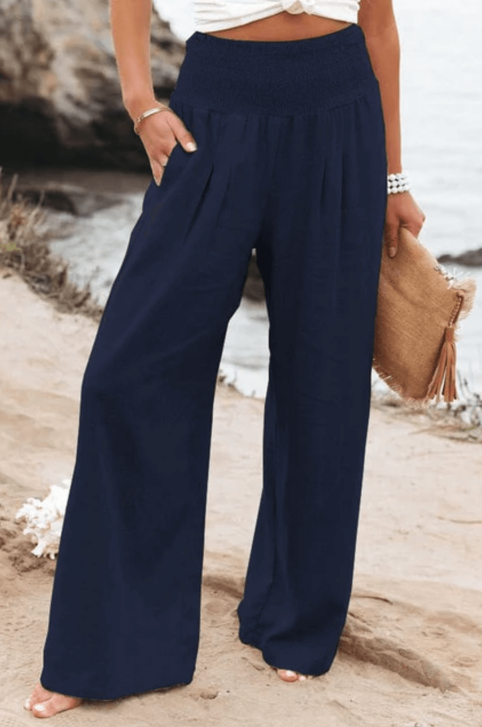 Elegant women's palazzo trousers, high-waisted and wide-leg, perfect for boho summer comfort & style.