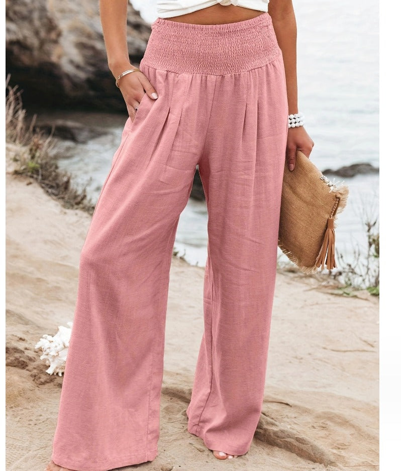 Summer-ready women's palazzo pants, wide-leg and high-waisted, bringing boho comfort & chic.
