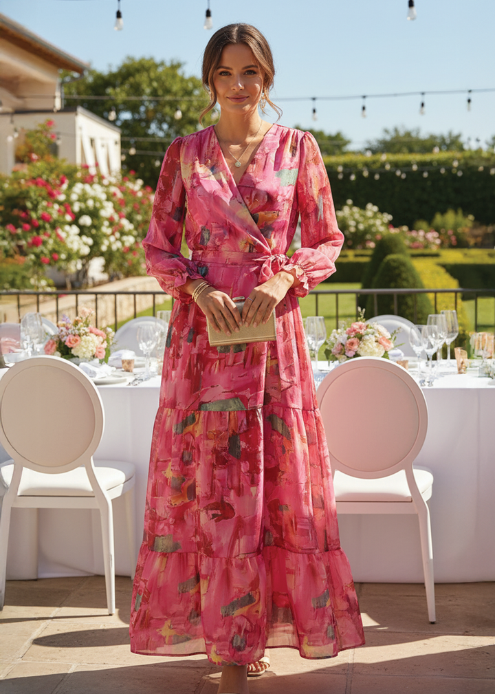 Elegant pink floral wrap maxi dress for women, perfect for summer parties or spring occasions. Features a beautiful print.