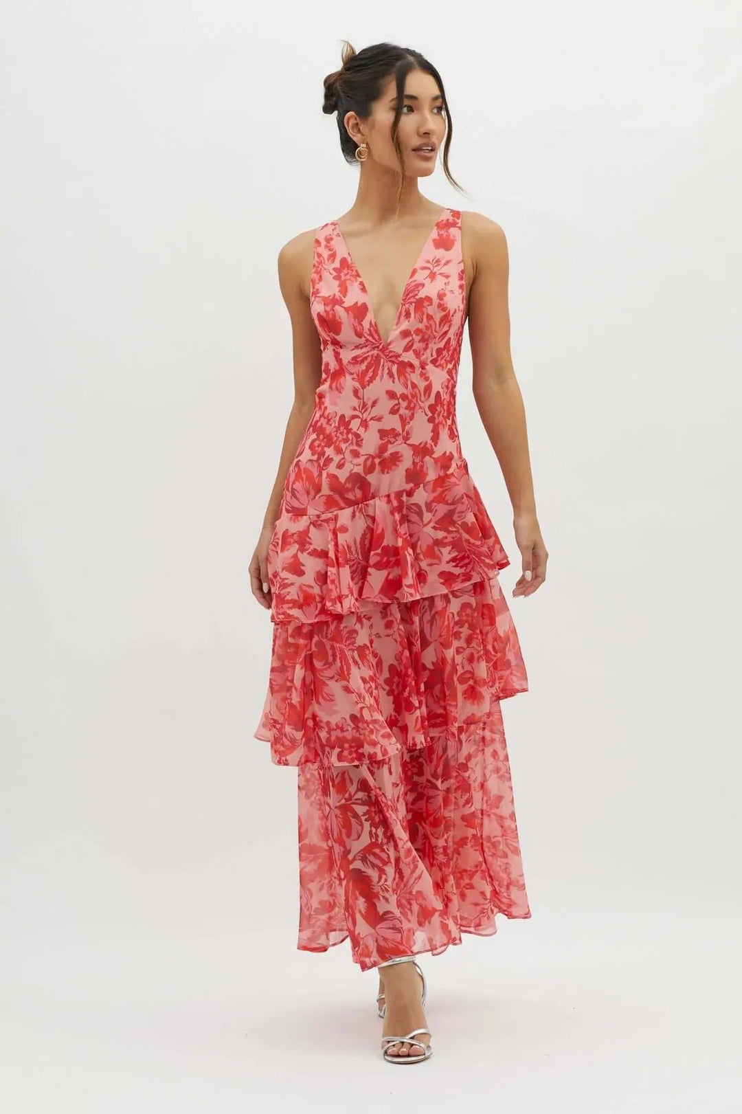 Flowy women's printed V-neck maxi dress with elegant ruffle tiers, perfect for wedding parties.