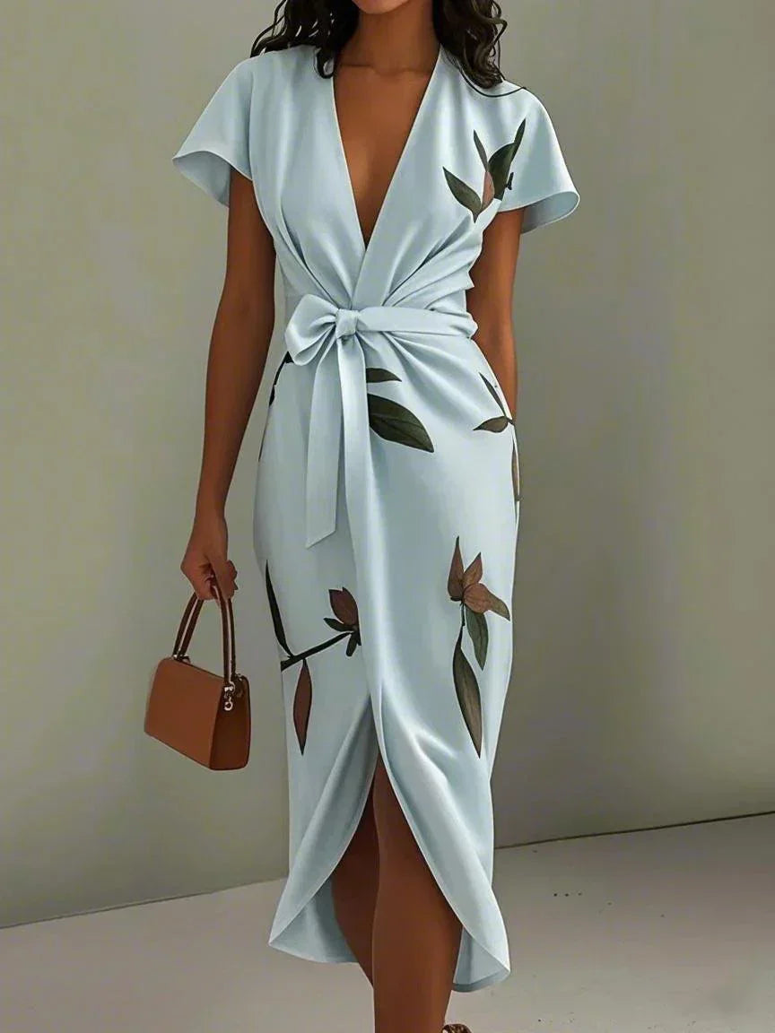 Women's stylish printed wrap dress, ideal for spring parties, casual day wear, or summer events.
