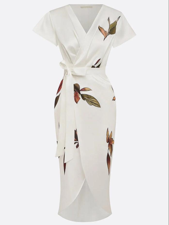 Front view: Women's elegant printed wrap midi dress with a stylish tie waist and flowing skirt.