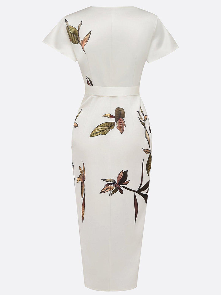 Side view: Women's floral printed wrap dress, showing the flowing midi skirt and adjustable tie-waist.