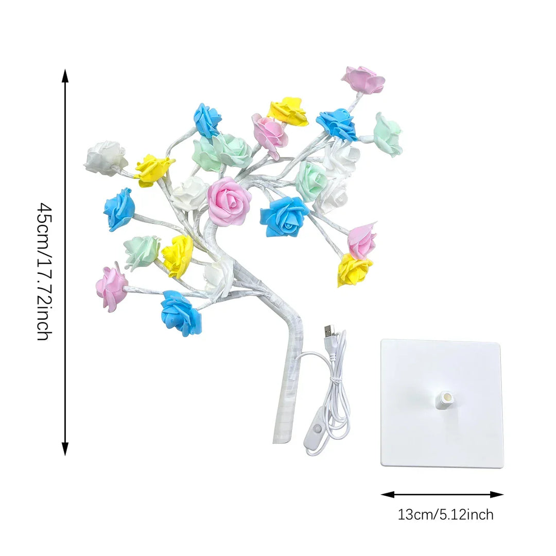 Rose LED USB night light on a bedside table, providing romantic ambiance. A charming decorative home accent.