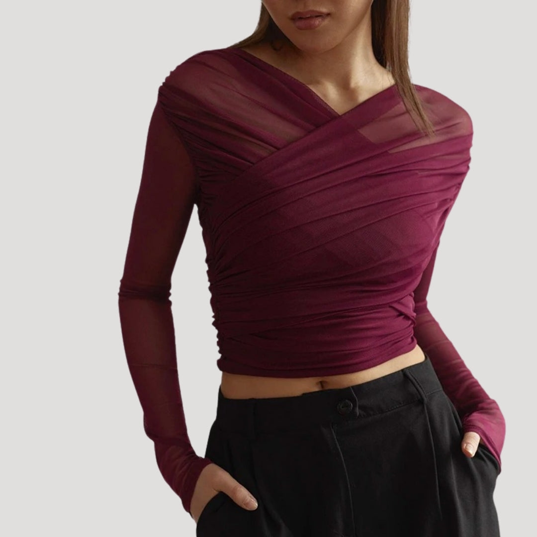 Stylish women's sheer long-sleeve wrap top, a perfect addition to spring wardrobe.