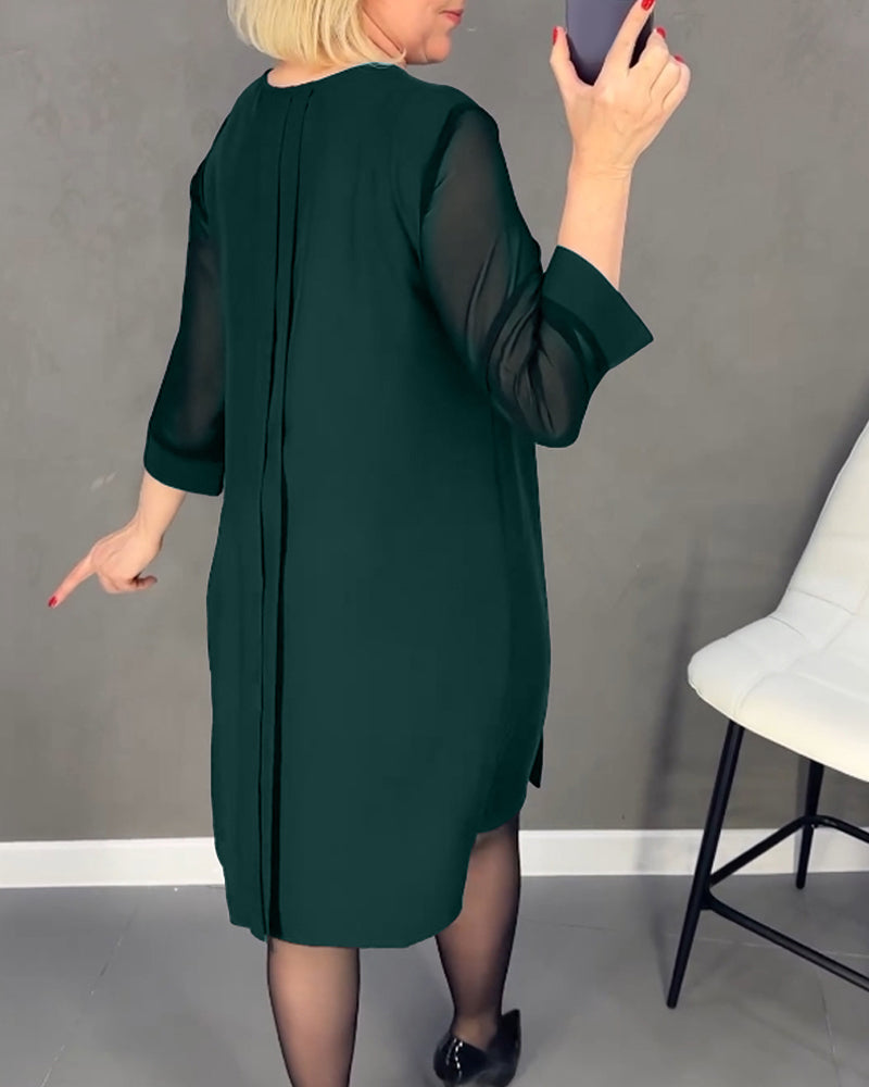 Elegant women's fall fashion shift dress, knee-length with subtle mesh accents & long sleeves for versatility.