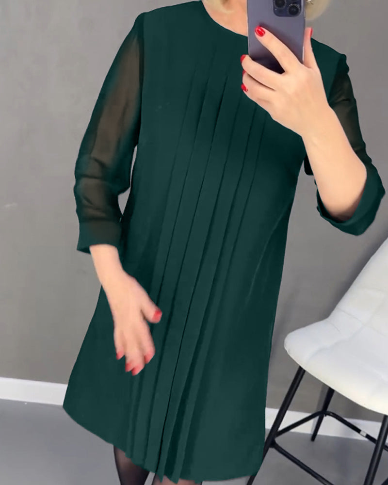 Versatile women's office shift dress, long sleeve with elegant mesh details, suitable for day to night wear.