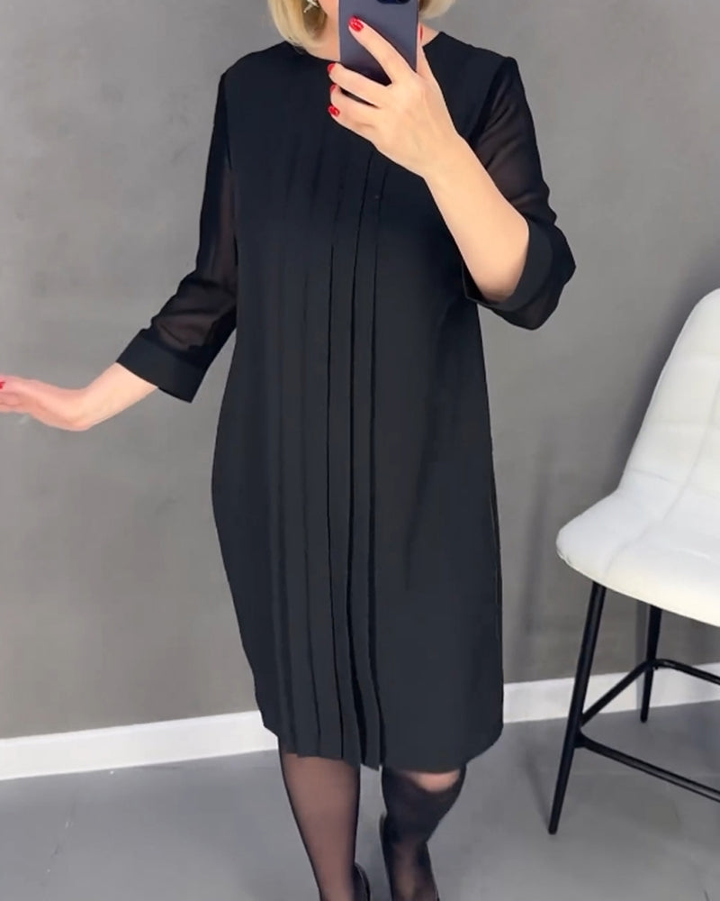 Sophisticated women's shift dress featuring stylish mesh details & long sleeves, great for fall office wear.