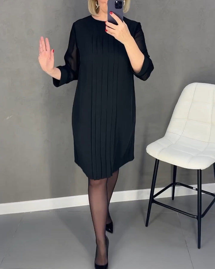 Elegant women's long sleeve shift dress with mesh panels, perfect for versatile office or cocktail events.