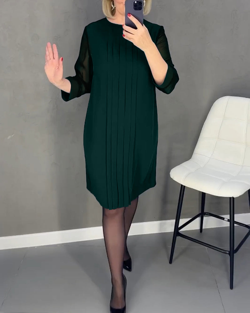 Women's versatile shift dress, knee-length, with chic mesh long sleeves, ideal for fall office & cocktail fashion.