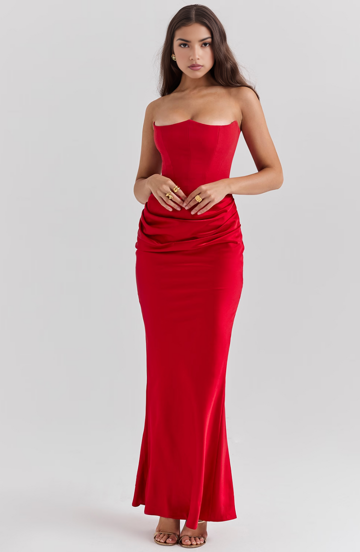 Stylish strapless maxi dress with a flattering corset, designed for modern wedding guests.