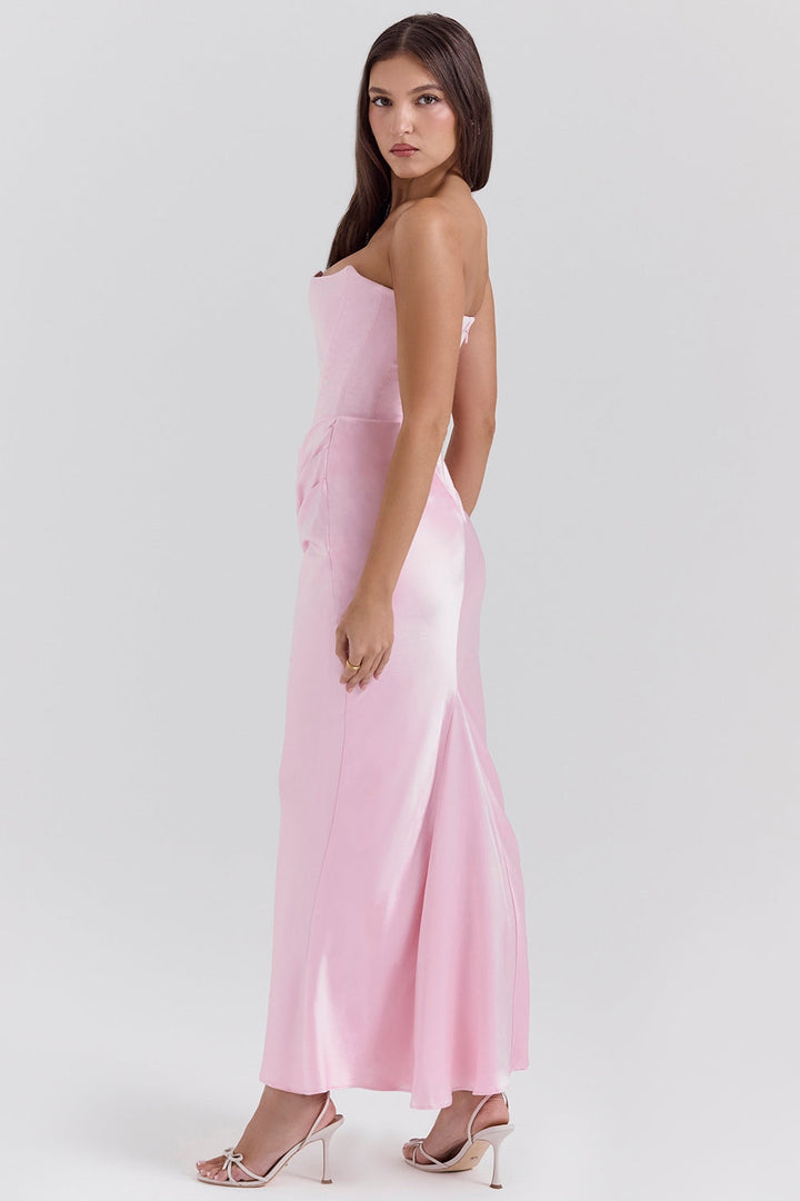 Flowing strapless maxi dress, a chic option for wedding guest attire.