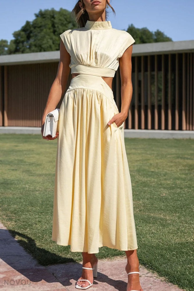 Vacation-ready women's midi dress, elegant, sleeveless, with a chic waist cut-out.