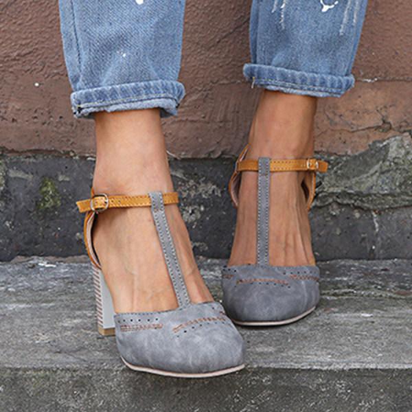 Stylish women's T-strap block heel party shoes with a round toe & comfortable fit.