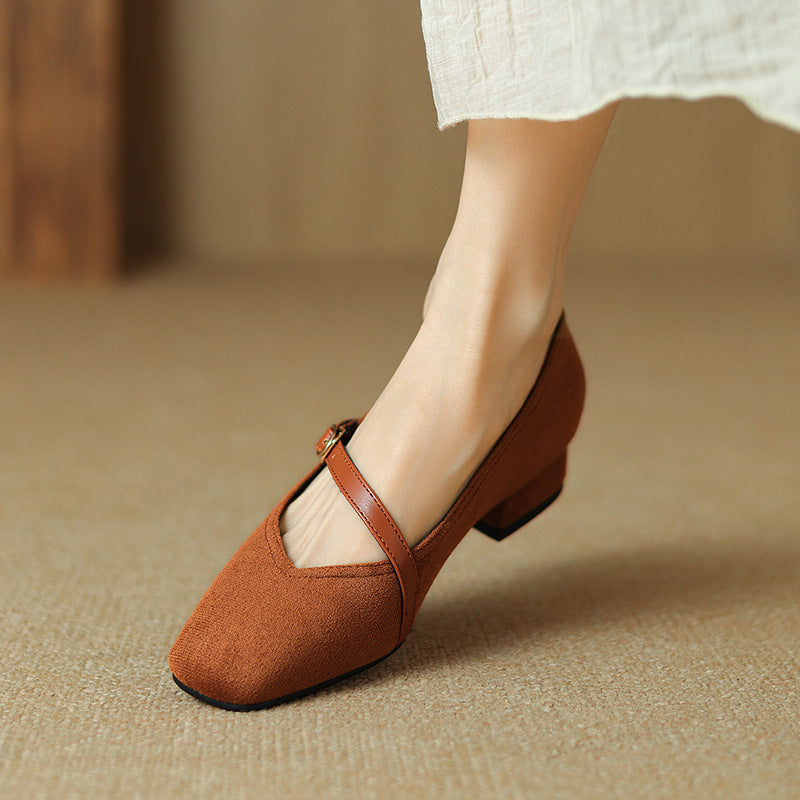 Front view of women's tan suede block heel pumps, elegant and versatile for any occasion.