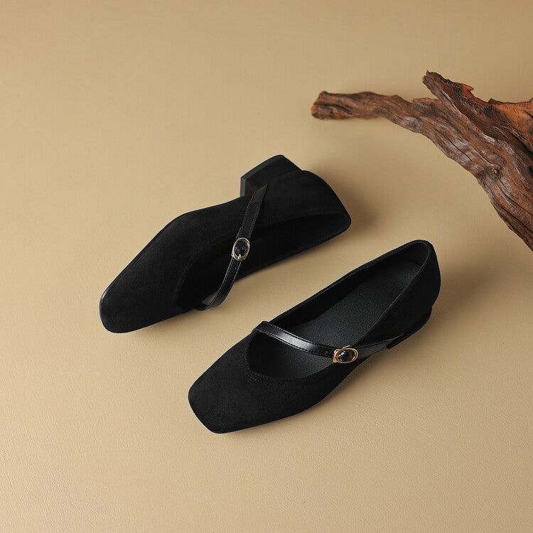 Women's black suede block heel pumps, providing a comfortable and elegant take on dressy footwear.