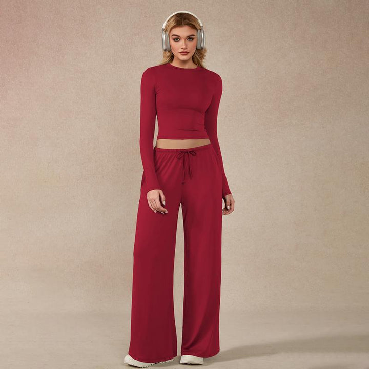 Stylish woman modeling the Valdora lounge set, showcasing the wide leg pants and long sleeve top