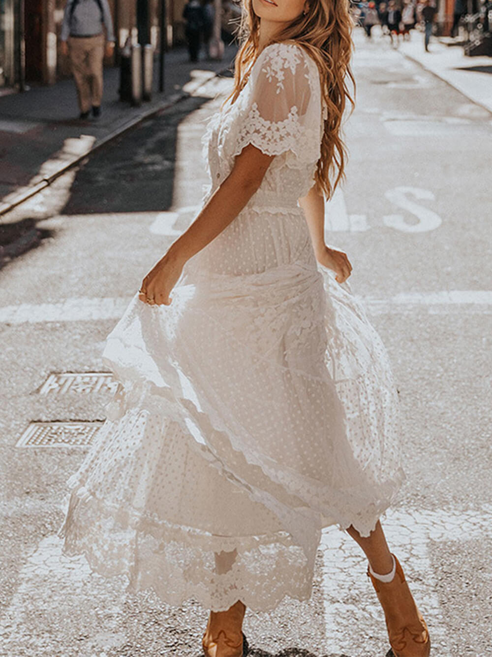 Feminine V-neck A-line midi dress for women in white, with a flowing, elegant silhouette and short sleeves.