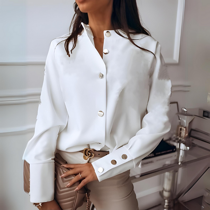 Elegant white women's long-sleeved button-front shirt for versatile everyday wear; classic and chic spring/fall fashion.