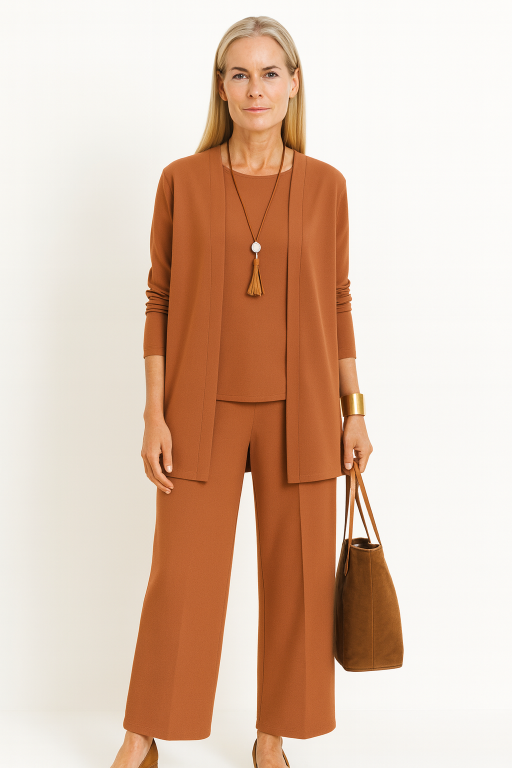 Designer women's 3-piece suit set. Elegant and versatile for business casual fashion.