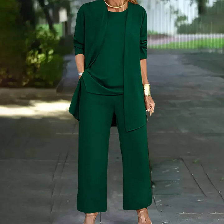 Elegant women's 3-piece pantsuit. Tailored blazer, vest & trousers in chic style for business or formal events.