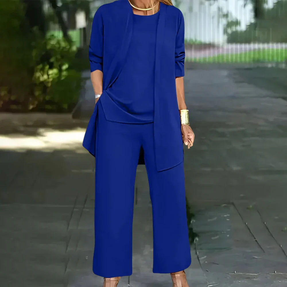 Modern women's 3-piece suit. A complete elegant ensemble with a tailored blazer, vest & pants, perfect for work.