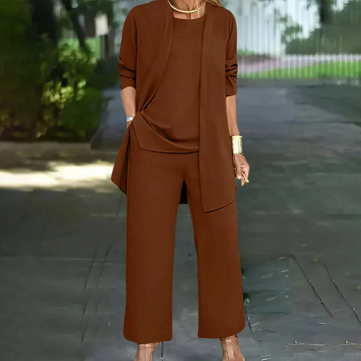 Sophisticated women's 3-piece pantsuit for business attire & formal wear. Elegant tailored blazer, vest & trousers.