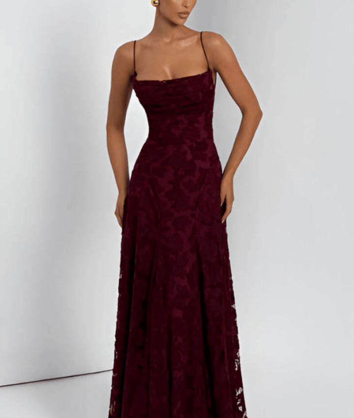 Elegant women's A-line maxi dress with spaghetti straps. Perfect for evening or formal occasions.