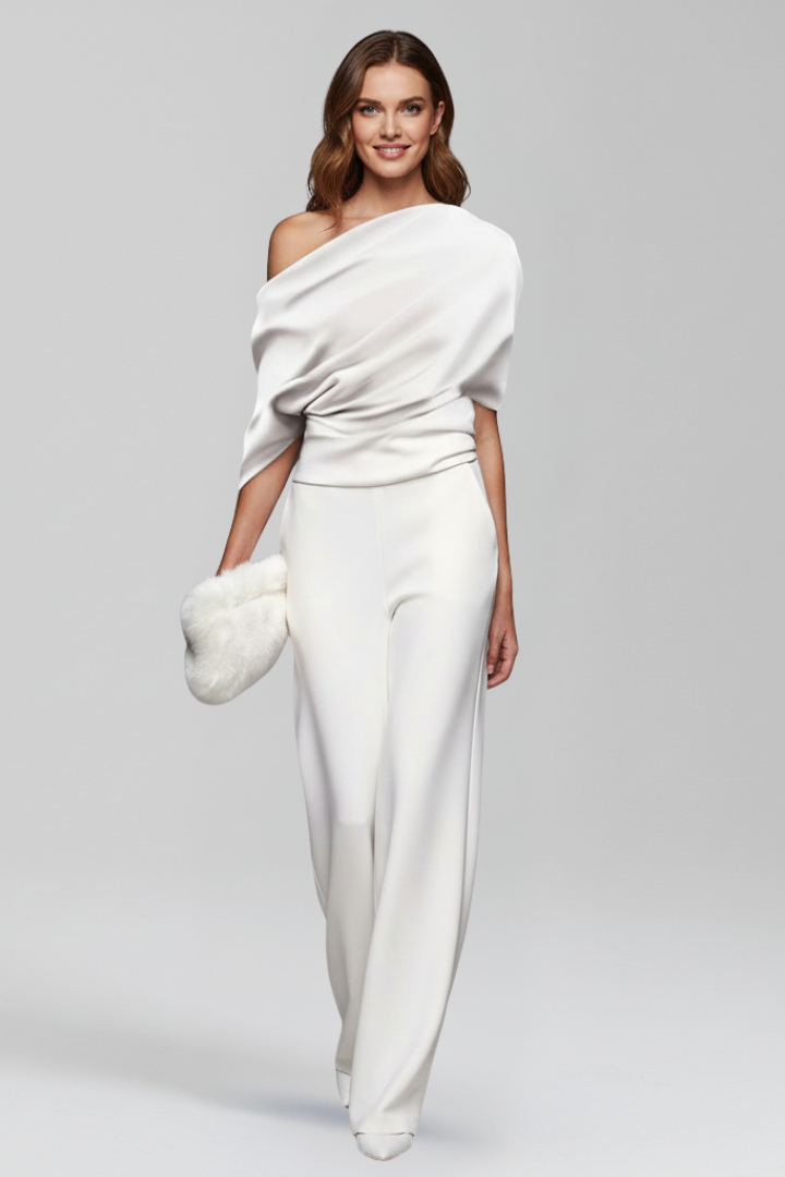 Flattering women's formal jumpsuit with an elegant asymmetric neckline and wide legs. Long sleeve, one-piece outfit.