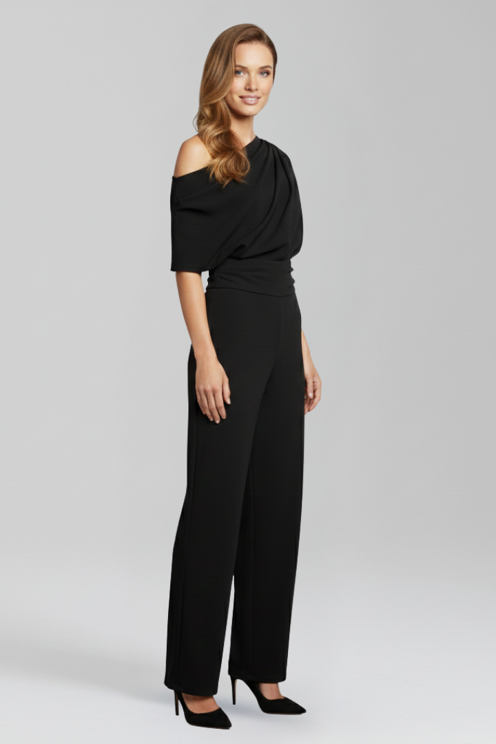 Sophisticated women's asymmetric wide leg jumpsuit with long sleeves. A flattering one-piece for elegant casual or formal wear.