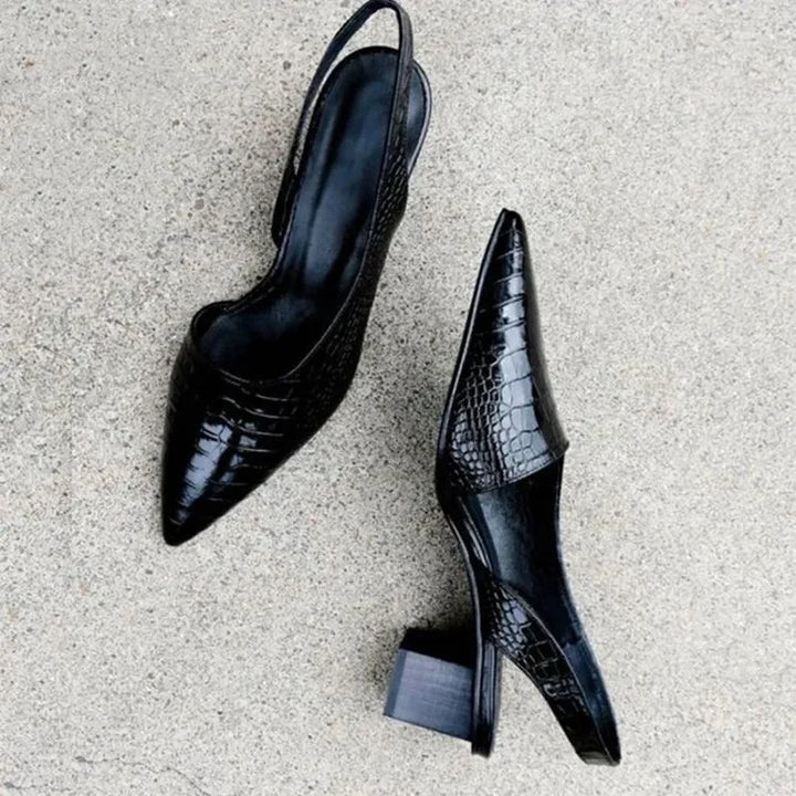 Elegant women's black block heel pumps, perfect for formal spring events and office wear.