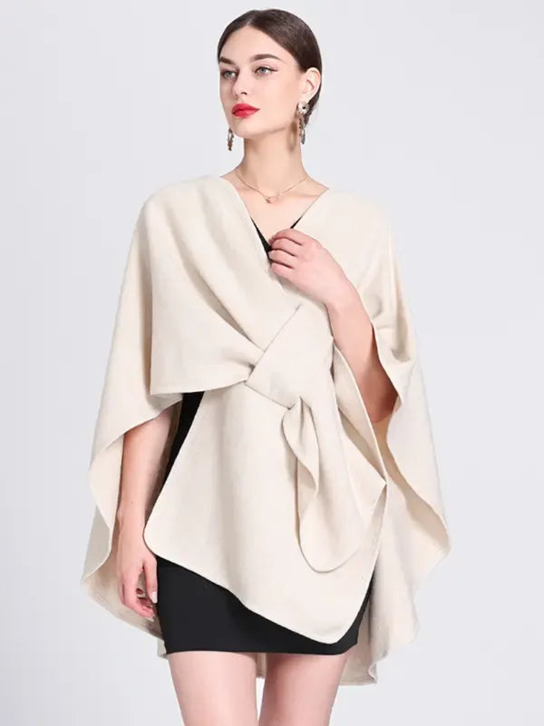 Elegant women's black wrap cape top, perfect for formal or casual wear, front view.