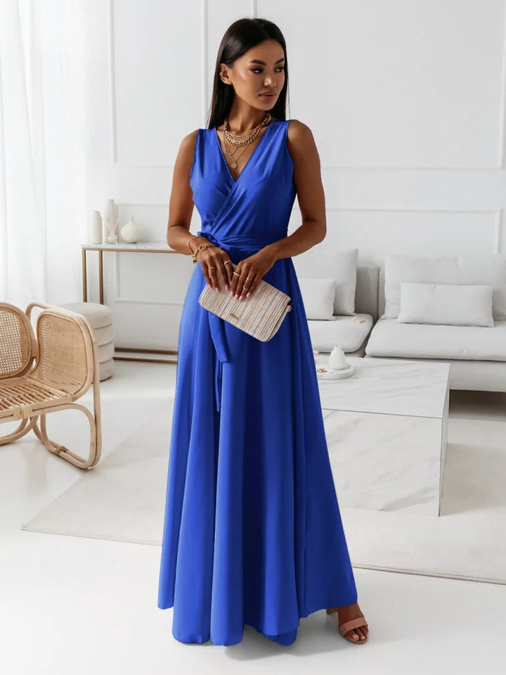 Women's stylish purple wrap maxi dress, offering an elegant and comfortable option for wedding attendees.