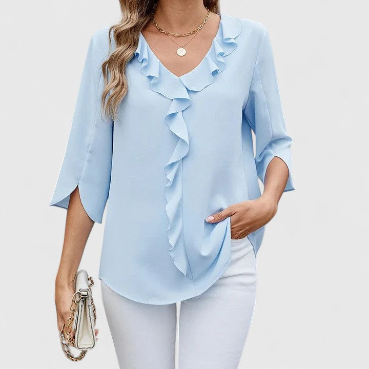 Elegant women's blouse, versatile for office & casual wear. Classic style fashion top for sophisticated looks.