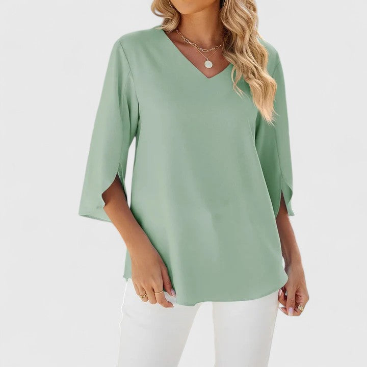 Sophisticated women's everyday blouse. Elegant fashion top for versatile styling, from office to casual.