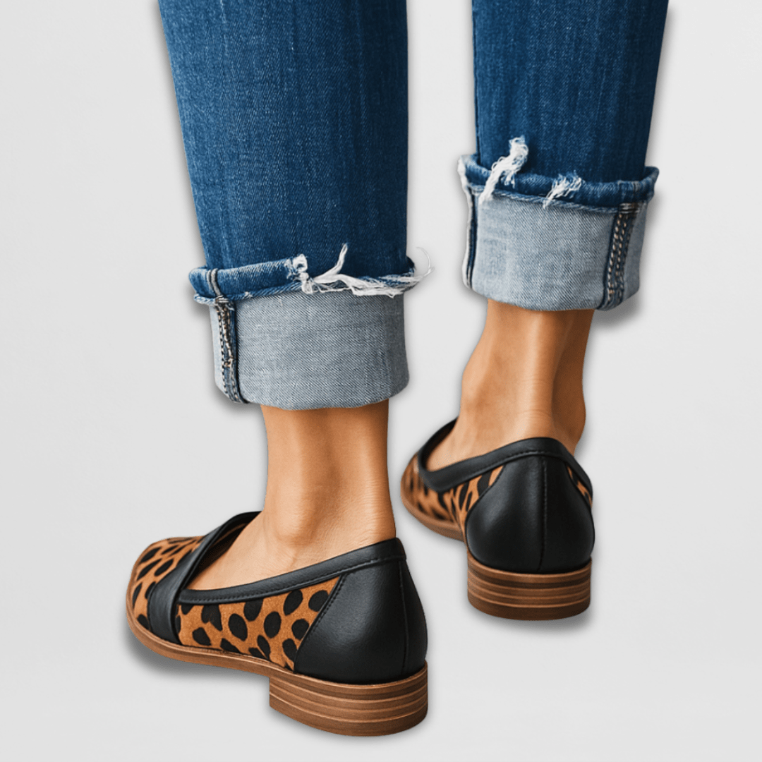 Women's sophisticated camel pointed-toe flat loafers. Effortless slip-on style, ideal office footwear.