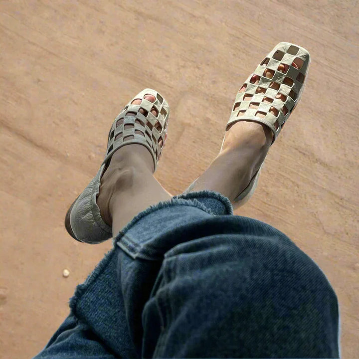 A collection of women's elegant checkered leather mules in various lighting, emphasizing their sophisticated style.
