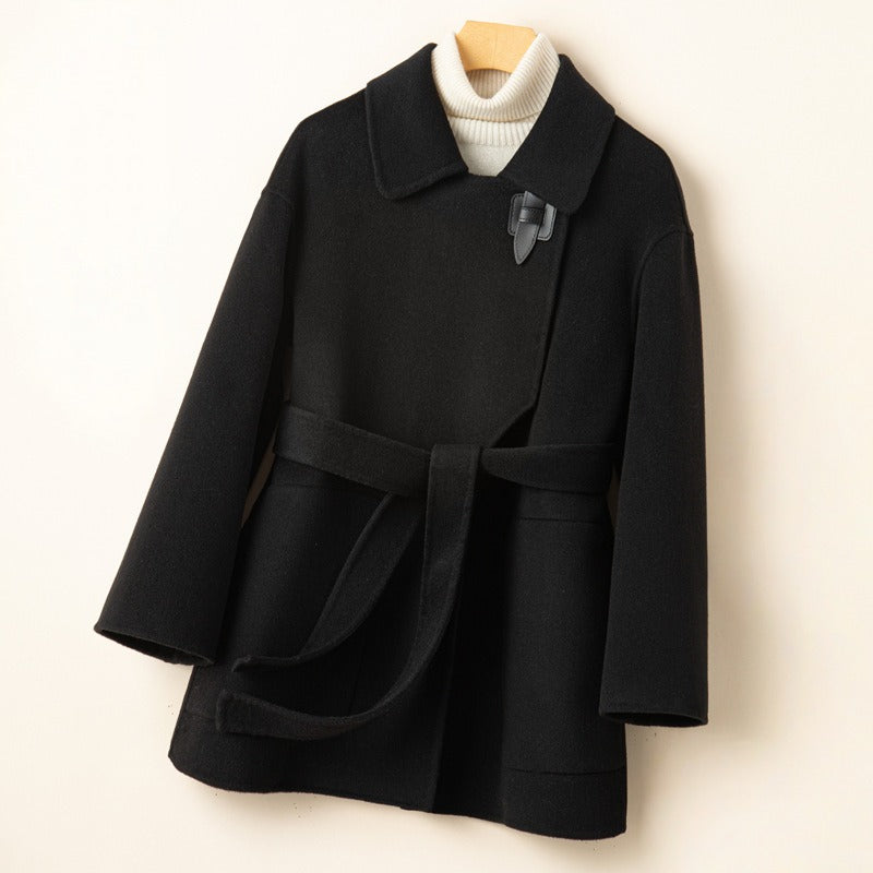 Stylish women's long wool blend wrap coat with a tie belt, ideal for a sophisticated winter look