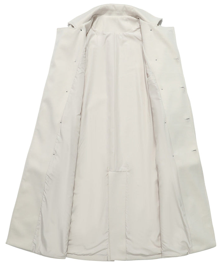 Full-length view of a women's double-breasted white trench coat, showcasing its classic elegance.