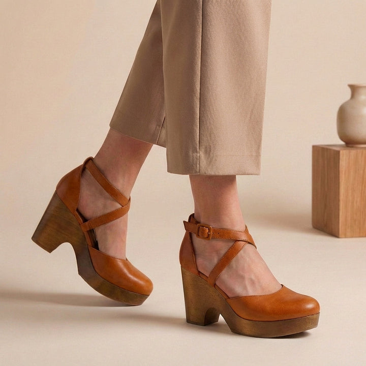 Stylish women's closed-toe block heel shoes with an adjustable ankle strap, perfect for comfortable elegance.