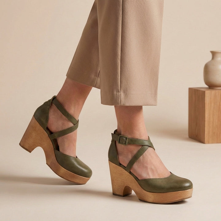 Chic women's closed-toe block heels featuring a secure ankle strap, ideal for sophisticated fashion.