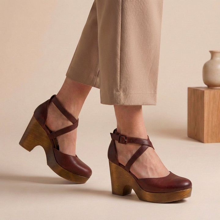 Fashionable women's closed-toe block heel shoes with an ankle strap, offering versatile and comfortable style.
