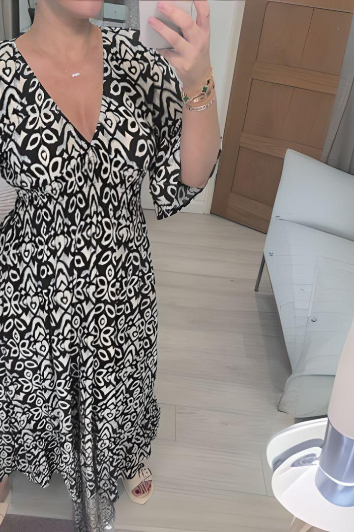 Soft, comfortable women's wrap maxi dress in a flowy fabric, showcasing elegant style for any summer occasion.