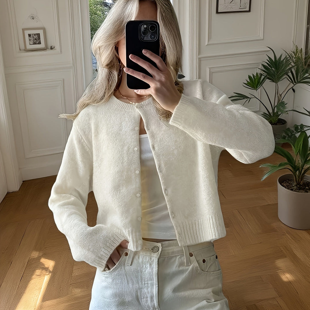 Soft alpaca blend cropped cardigan for women, featuring a knit texture, long sleeves, and a flattering fit