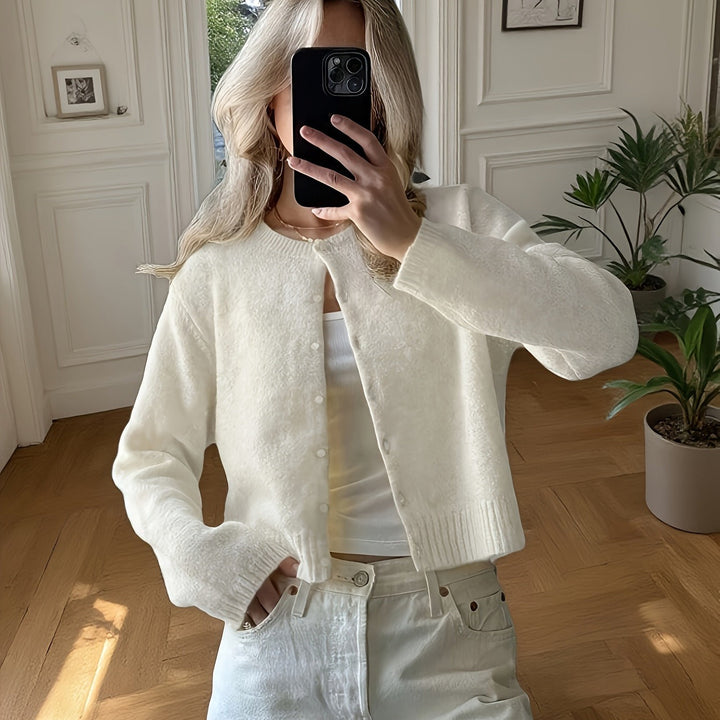 Soft alpaca blend cropped cardigan for women, featuring a knit texture, long sleeves, and a flattering fit