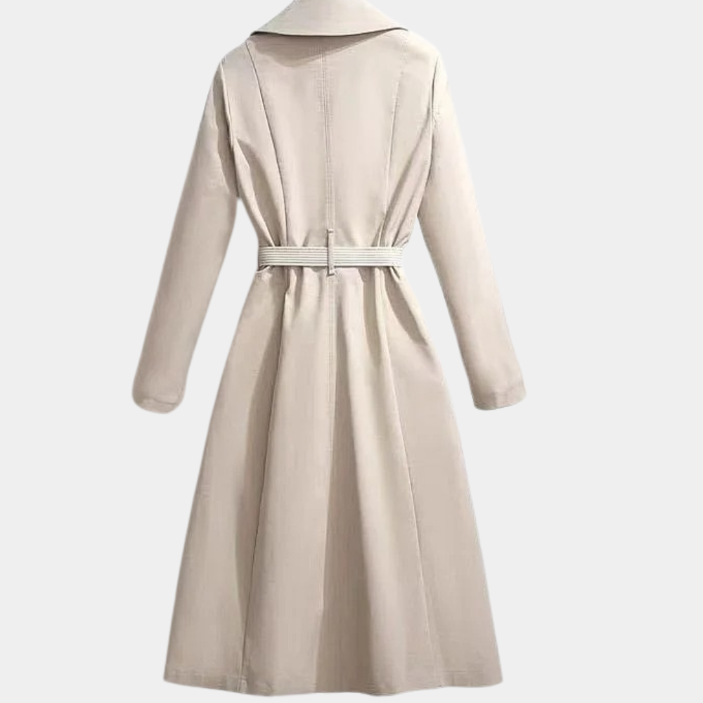 Fashionable women's double-breasted trench coat with belt, showcasing a sophisticated outerwear style.