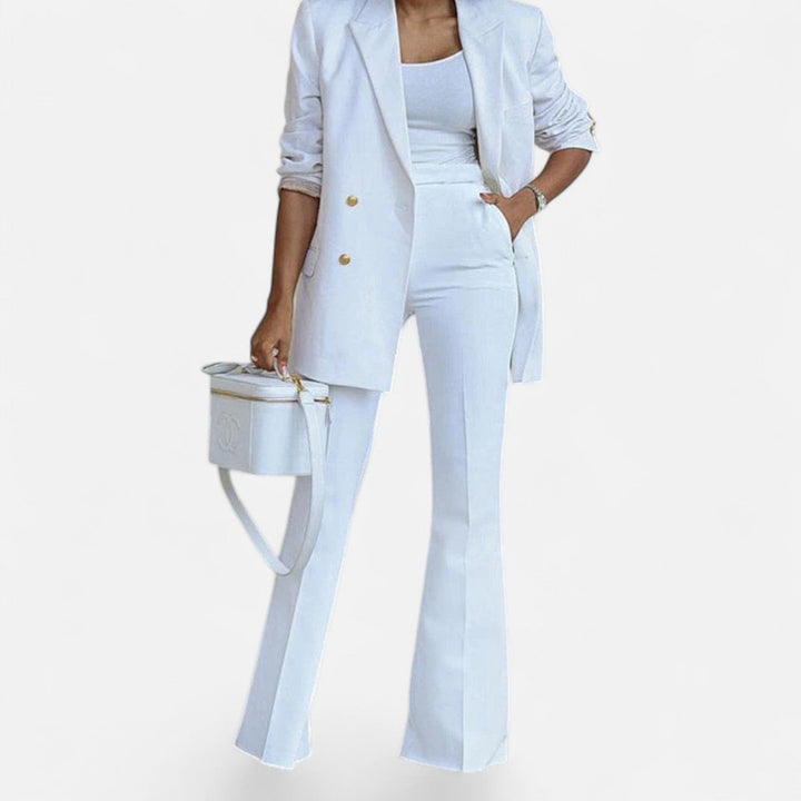 Stylish double-breasted blazer and tailored pants outfit for women, ideal for spring and summer fashion.